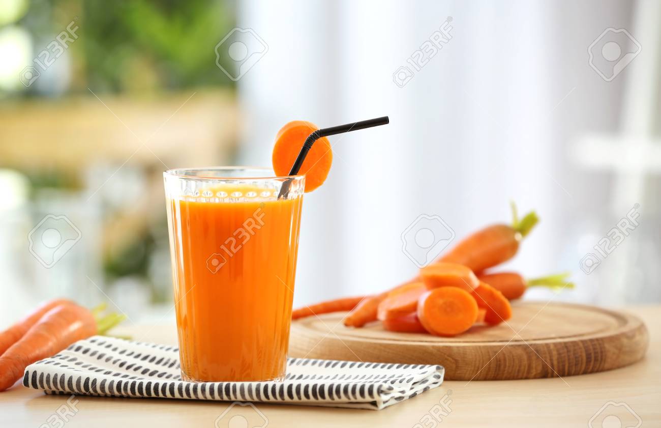 Glass of fresh carrot juice